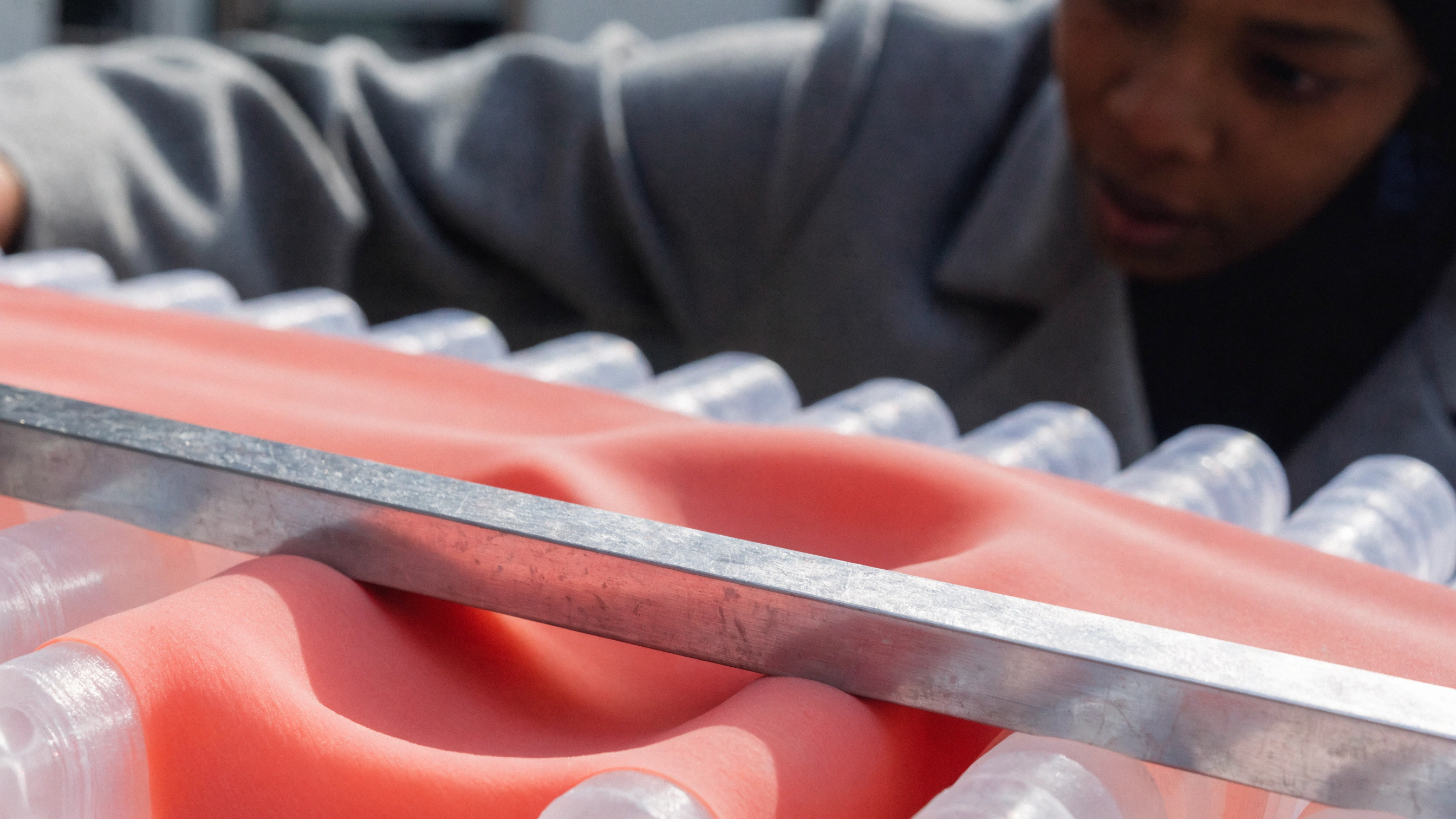 The released membrane returns toward its original contour with one shallow impression left.